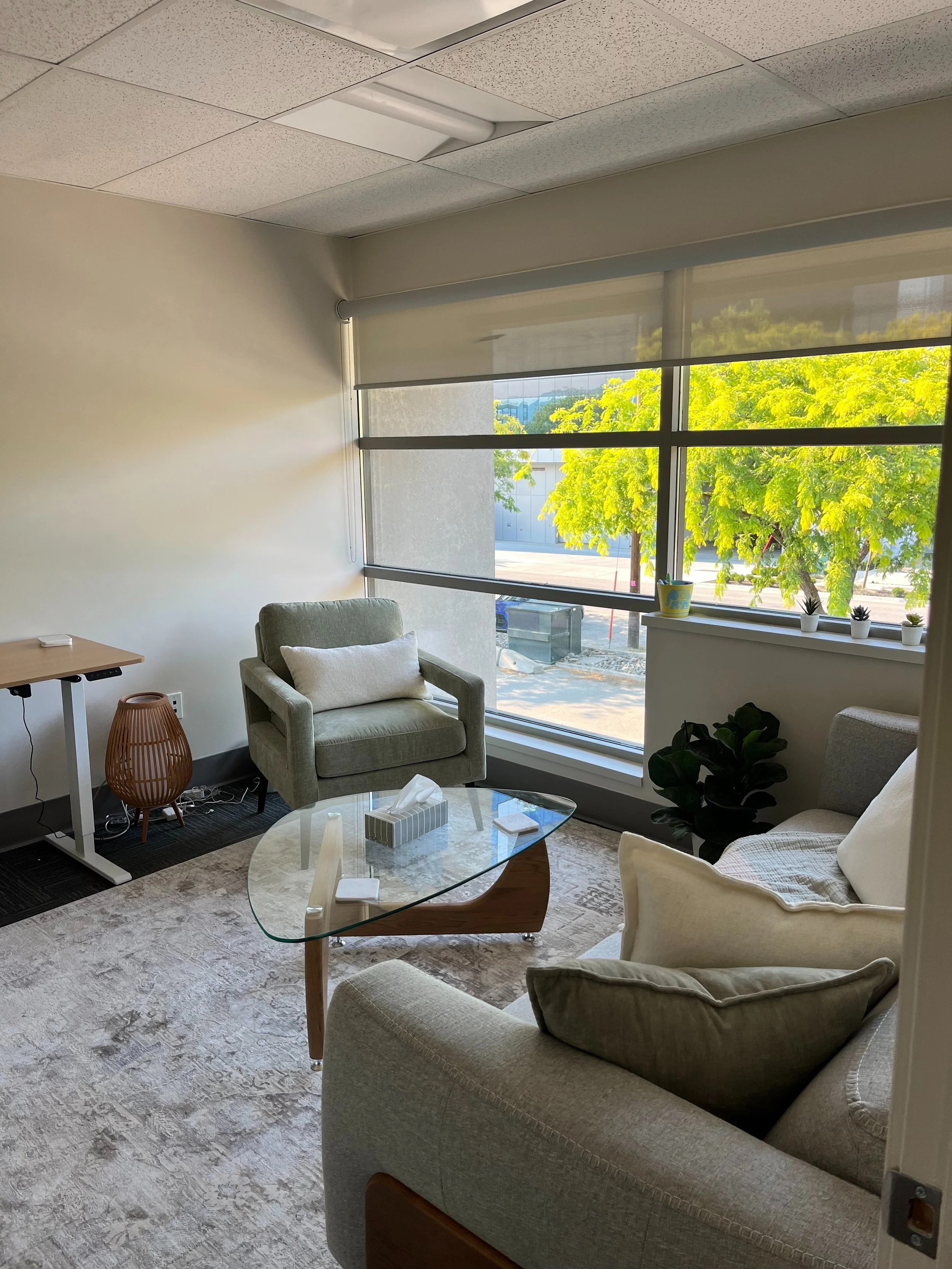Comfortable counselling room with natural light